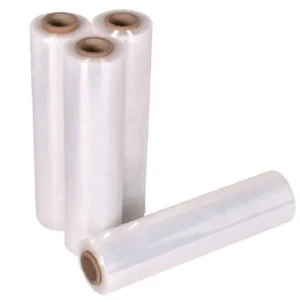 Several rolls of white plastic film in a box, is biodegradable or eco-friendly, representing multiple sustainable options for packaging or food storage solutions.