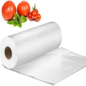A biodegradable fruit and vegetable bag is shown in its rolled and unfolded states, with tomatoes next to it. The white translucent material highlights the environmentally friendly packaging.