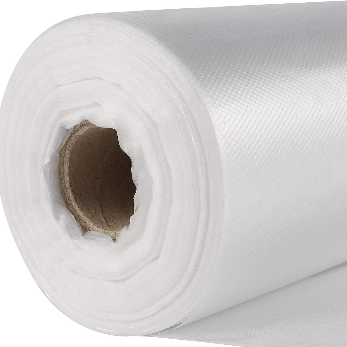A roll of white biodegradable fruit and vegetable bags, tightly rolled, with a brown paper core in the center and a smooth surface, showing the original shape and texture of the product.