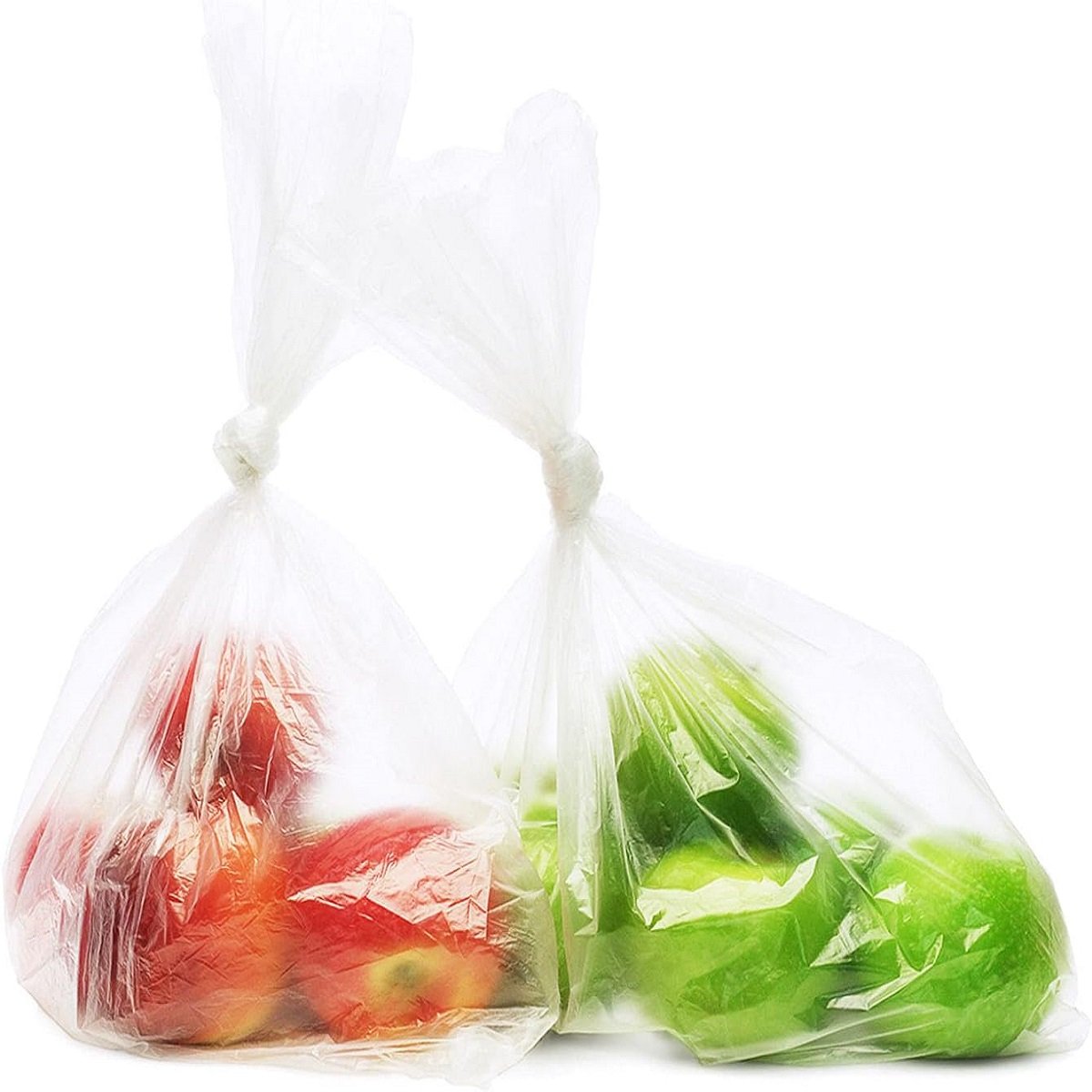 Two biodegradable fruit and vegetable bags contain red apples and green apples respectively. The bags are transparent, showing the product's usage status and load-bearing capacity.
