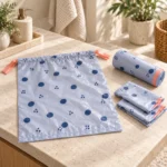 Flat 4 gallon compostable drawstring bag with compact roll and folded liners