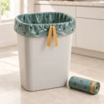 13 gallon compostable drawstring bin liner fitted to a tall kitchen bin