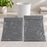 Standard and taller 15-gallon compostable trash bag samples side by side